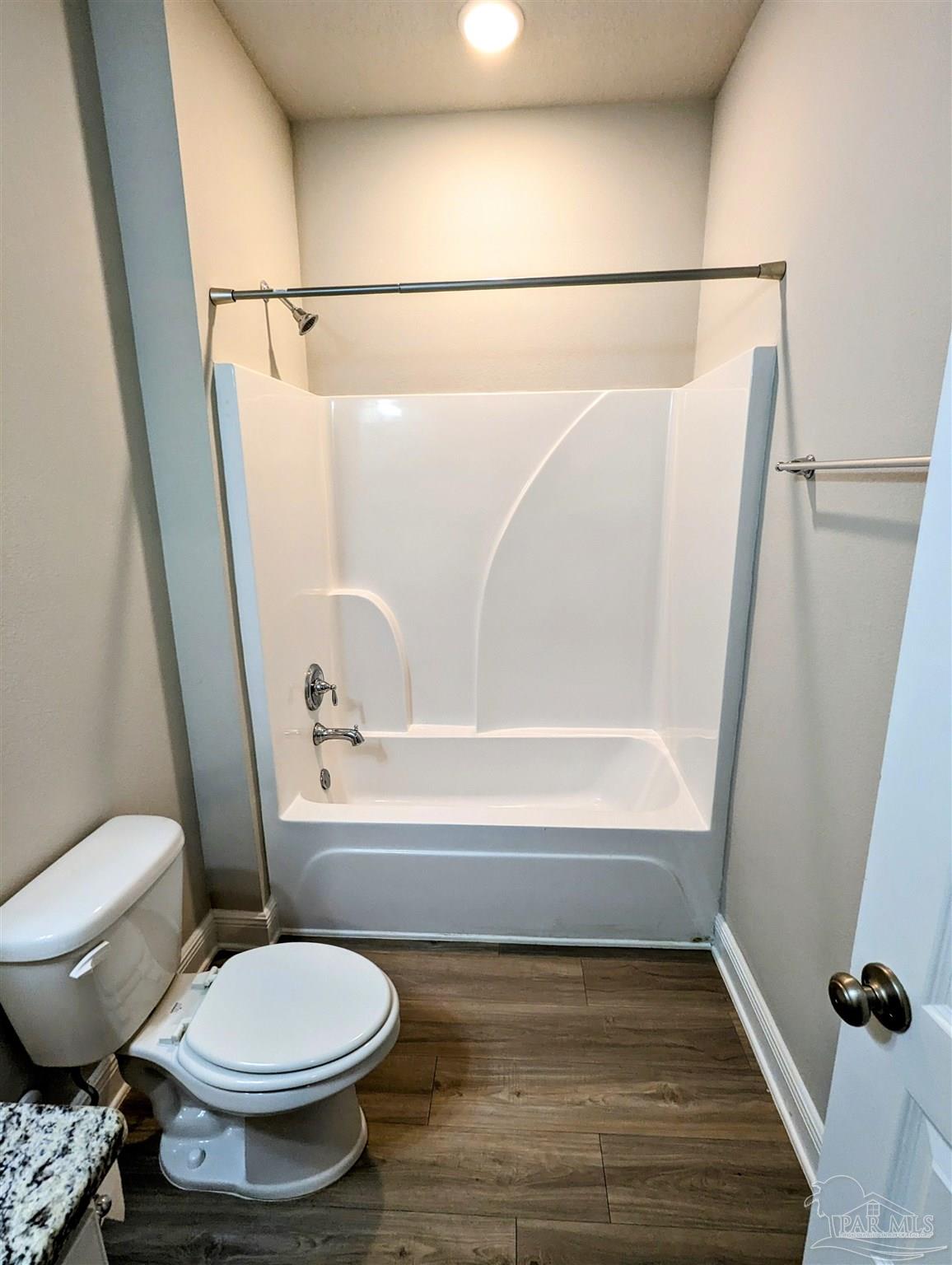 5348 Red Shoulder Road Pace, FL 32571 - Photo 10 of 39 a bathroom with a toilet and a shower