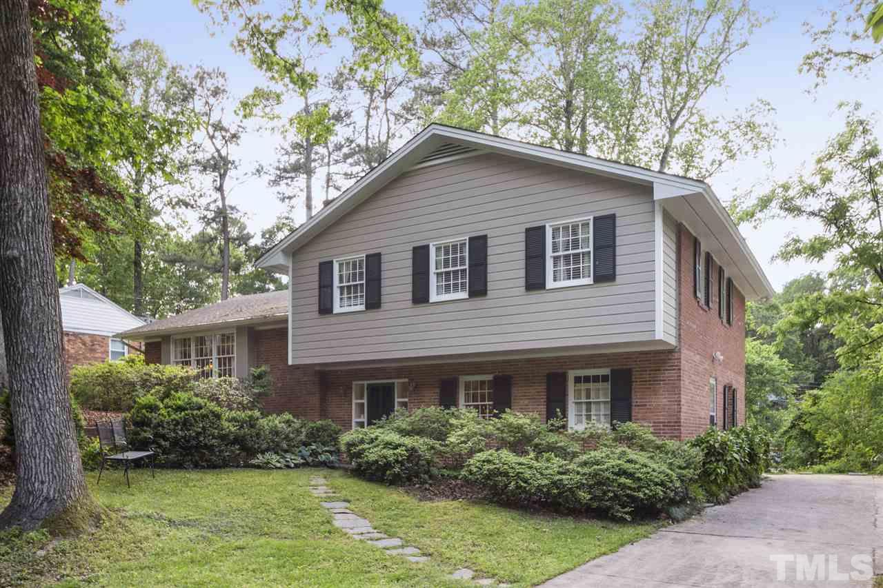 3701 Dade Street Raleigh, NC 27612 - Photo 2 of 23 Newly painted exterior front. Large flat front yard with mature trees make this a beautiful home setting!