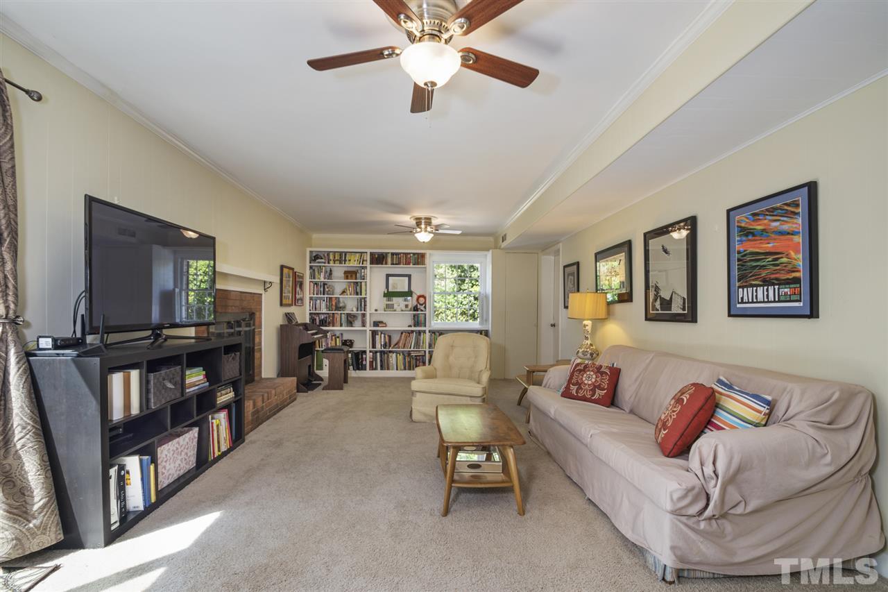 3701 Dade Street Raleigh, NC 27612 - Photo 17 of 23 Large family rooms opens up to beautiful backyard area.