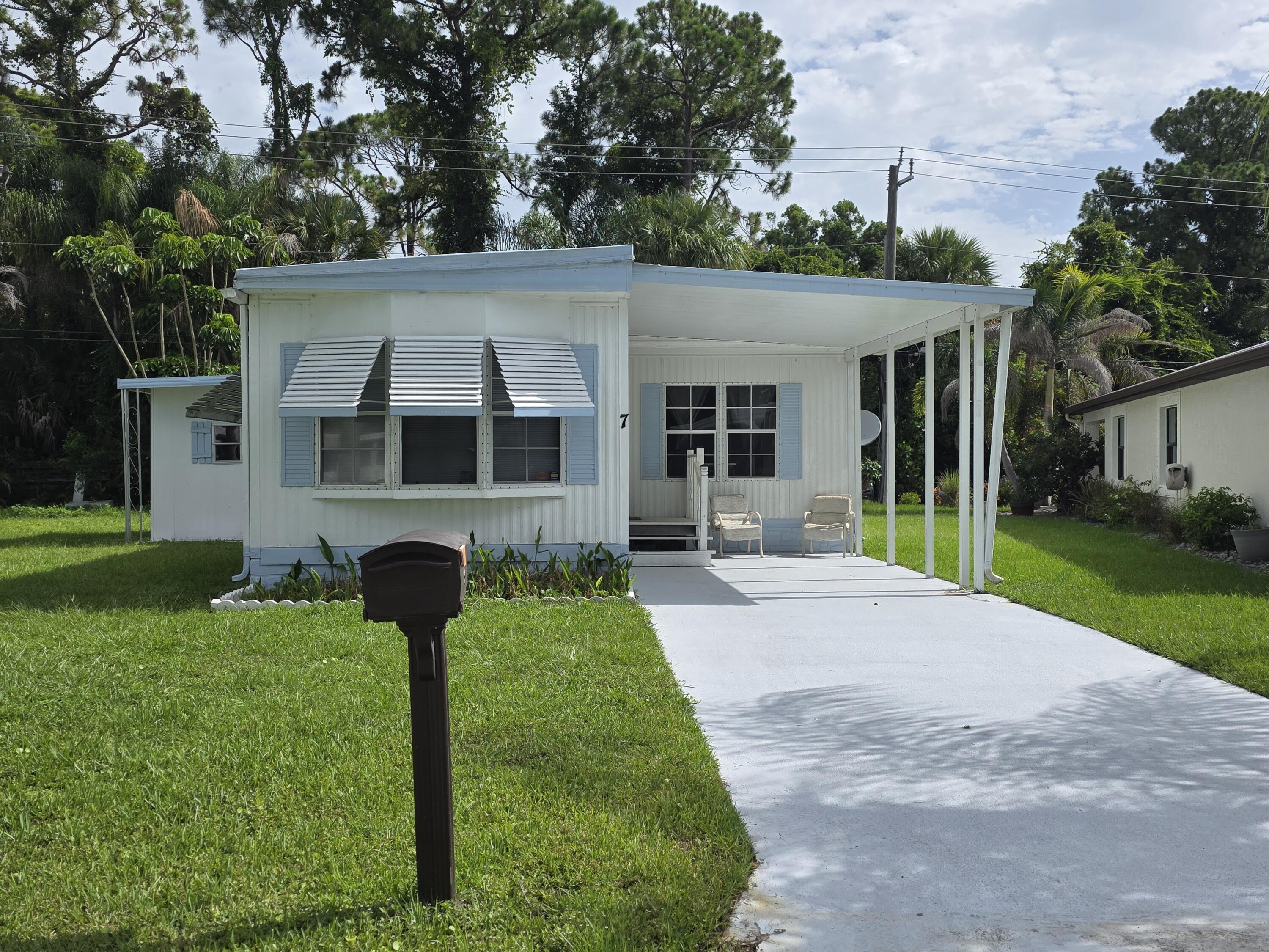 7 Quintana Roo Lane Port St. Lucie, FL 34952 - Photo 2 of 14 20260713_100726