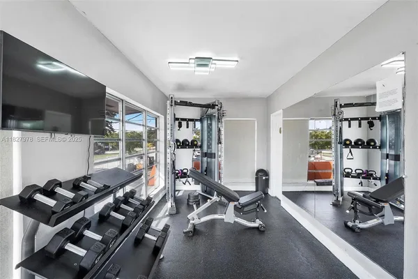 a view of a room with gym equipment