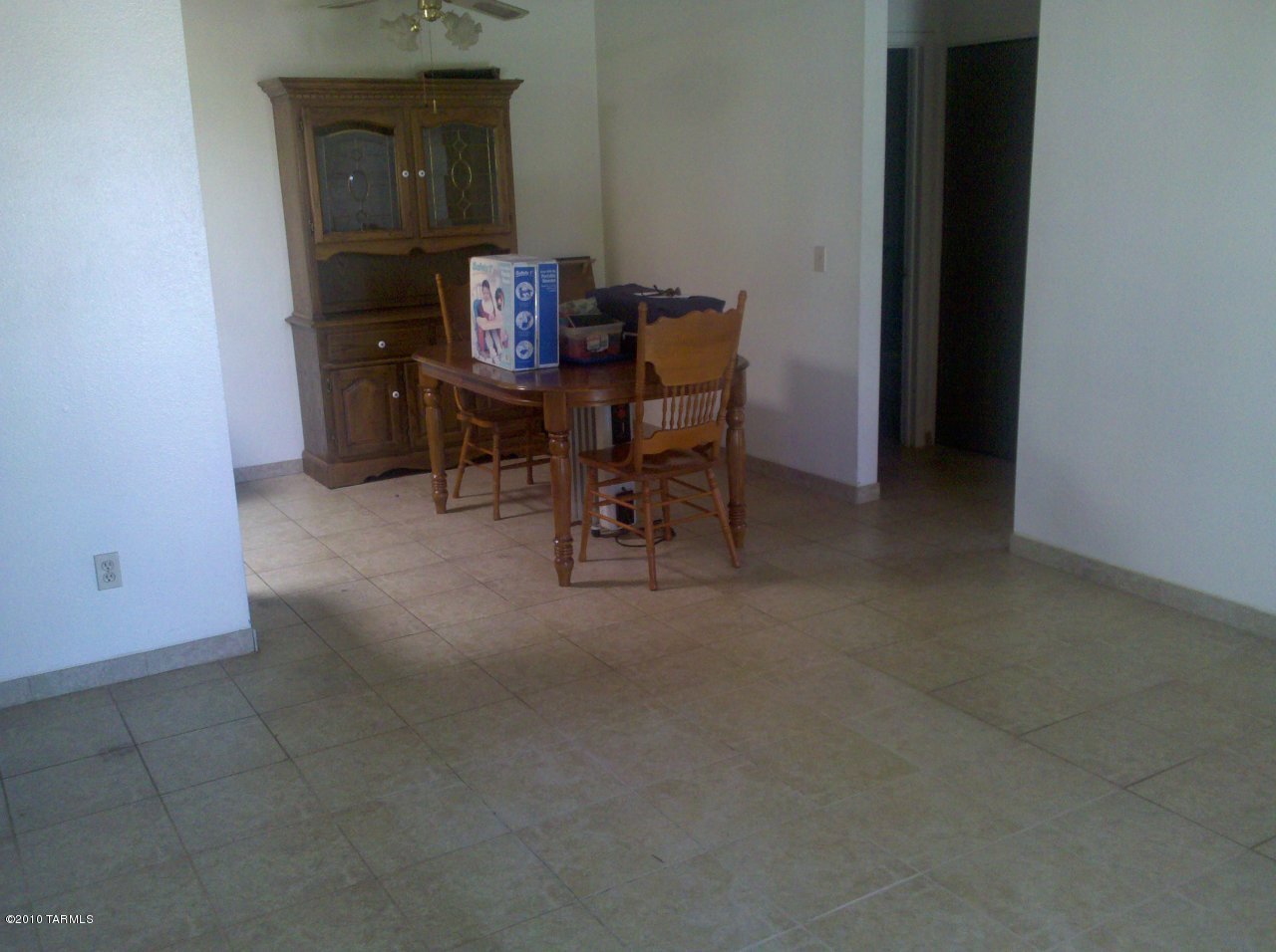 6615 East Golf Links Road, Unit 9 Tucson, AZ 85730 - Photo 4 of 6 a workspace with furniture and a window