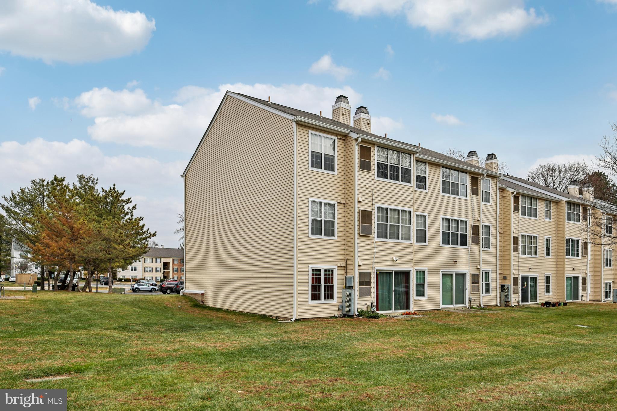 14901 Cleese Court, Unit 5CE Silver Spring, MD 20906 - Photo 24 of 25 a front view of building with yard