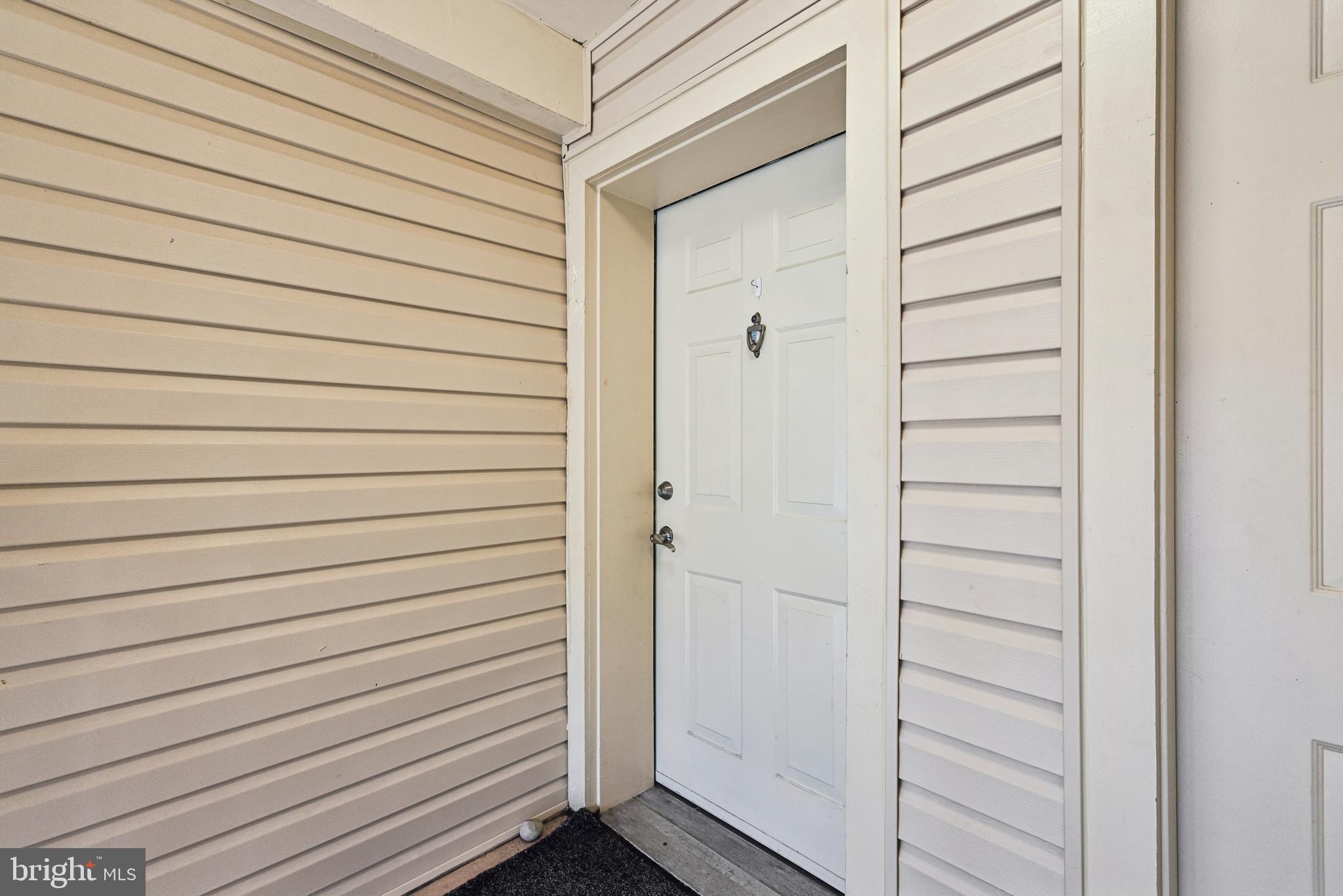 14901 Cleese Court, Unit 5CE Silver Spring, MD 20906 - Photo 3 of 25 a view of wooden door