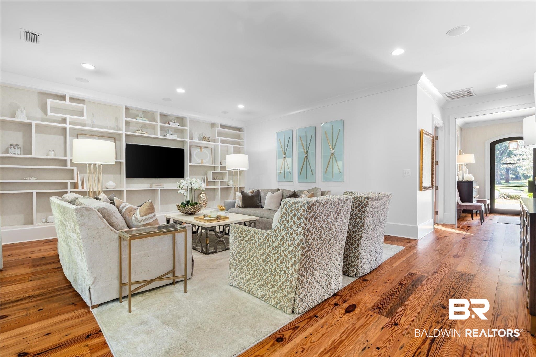 320 Long Court Mobile, AL 36608 - Photo 13 of 61 Living room featuring light hardwood / wood-style flooring, built in features, and ornamental molding