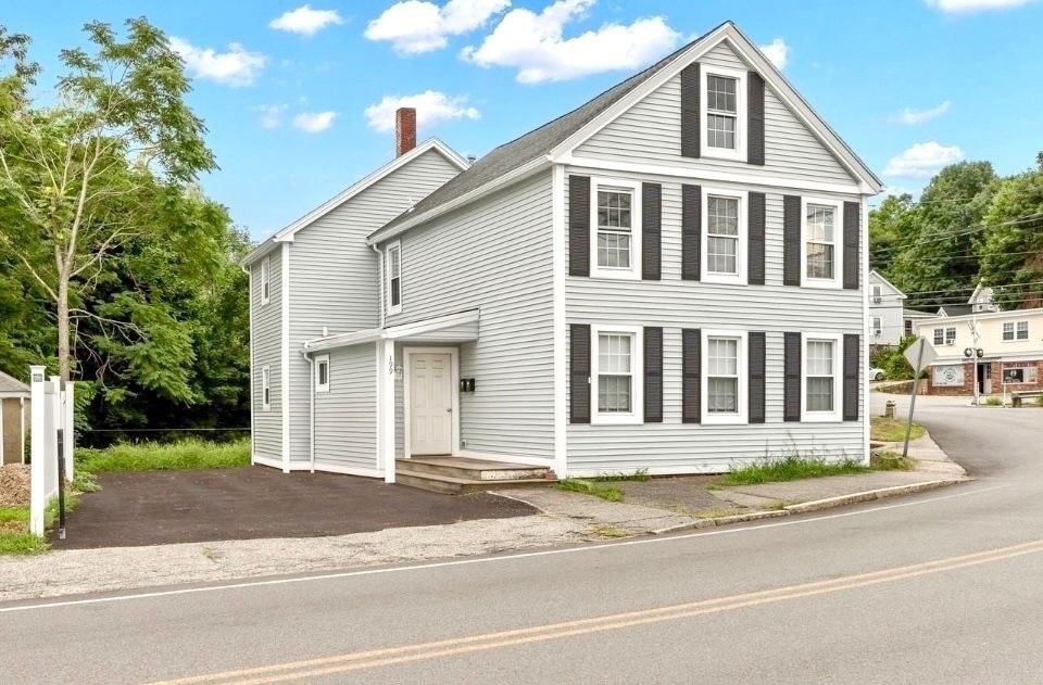 a front of a house with a yard