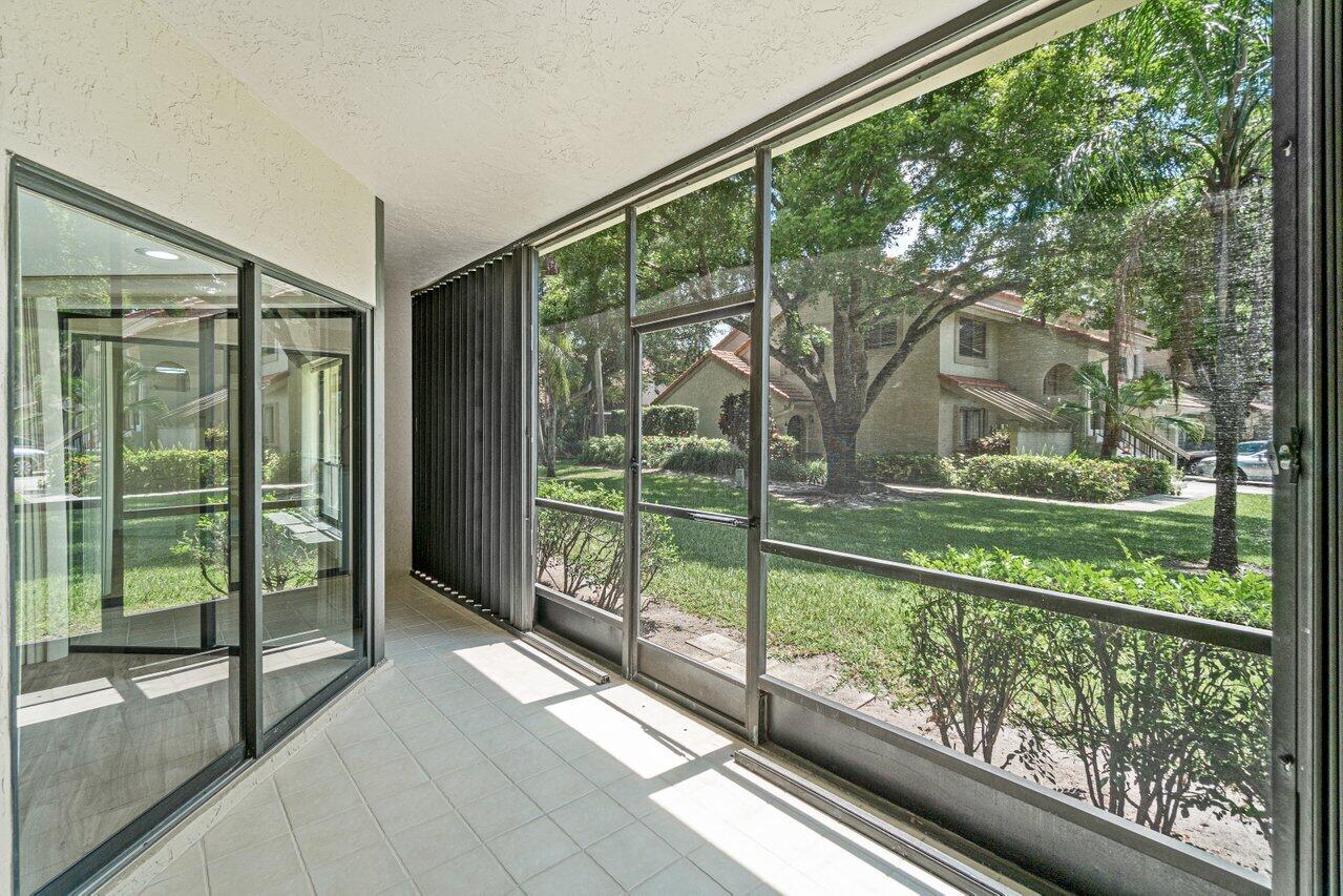 5560 Coach House Circle, Unit B Boca Raton, FL 33486 - Photo 14 of 30 TRANQUIL VIEWS FROM PATIO