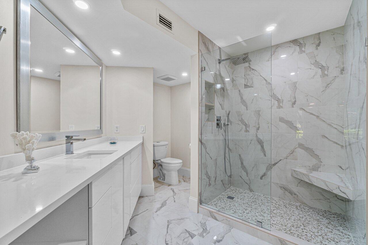 5560 Coach House Circle, Unit B Boca Raton, FL 33486 - Photo 18 of 30 STUNNING BATH W/HUGE TILED SHOWER