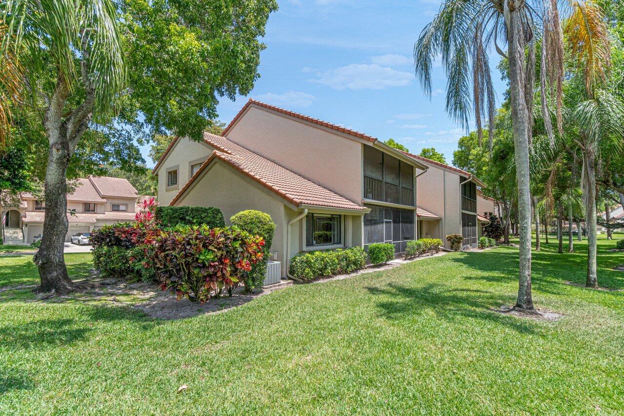 5560 Coach House Circle, Unit B Boca Raton, FL 33486 - Photo 26 of 30 LUSHLY LANDSCAPED CORNER LOCATION