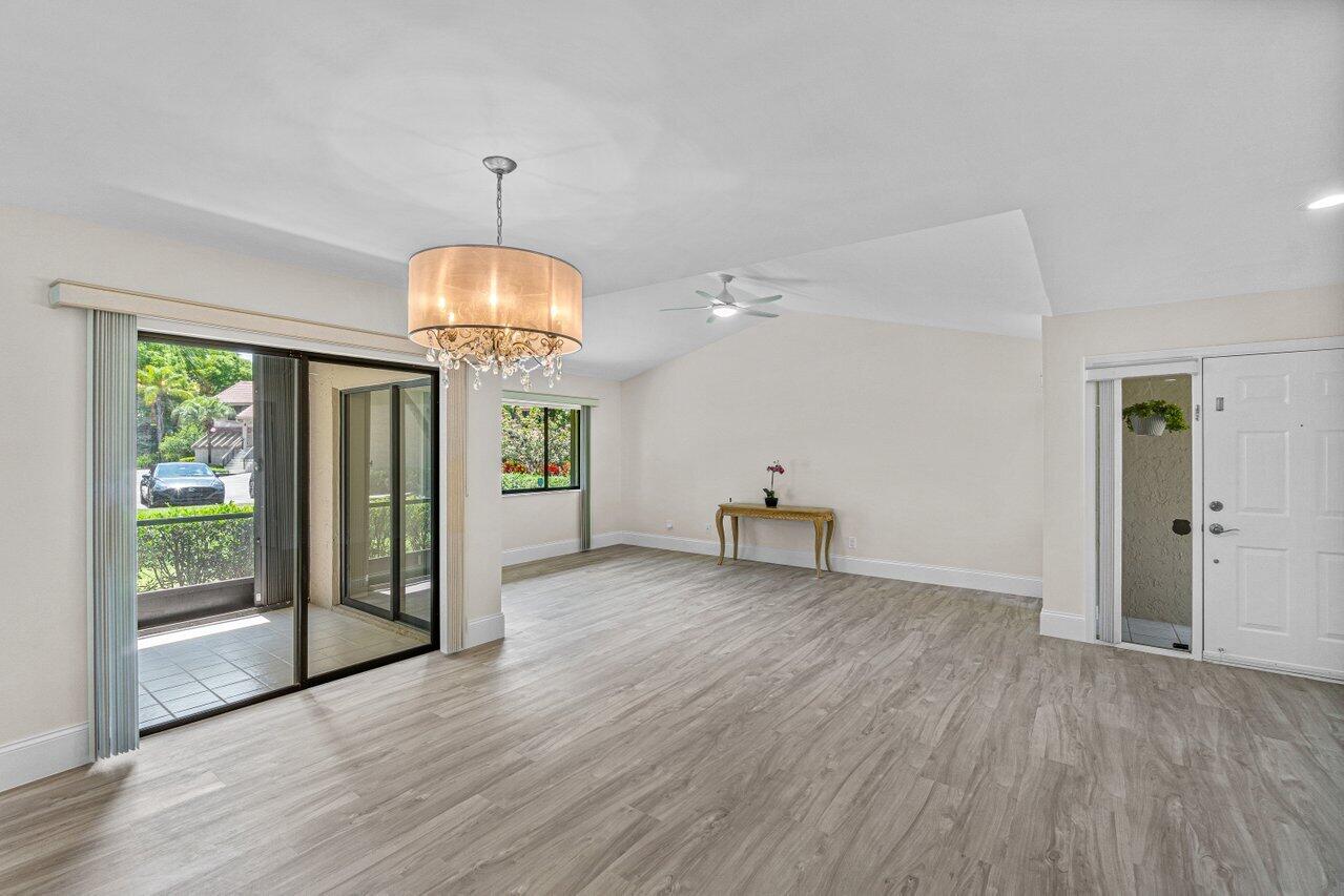5560 Coach House Circle, Unit B Boca Raton, FL 33486 - Photo 6 of 30 DINING AND LIVING ROOM