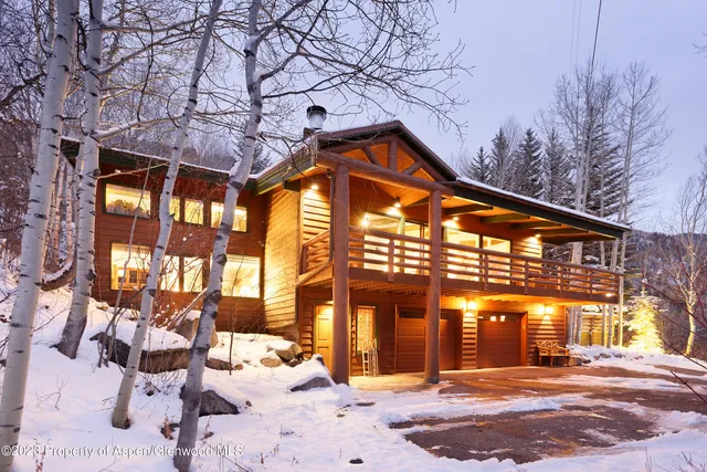 a view of a building with a yard