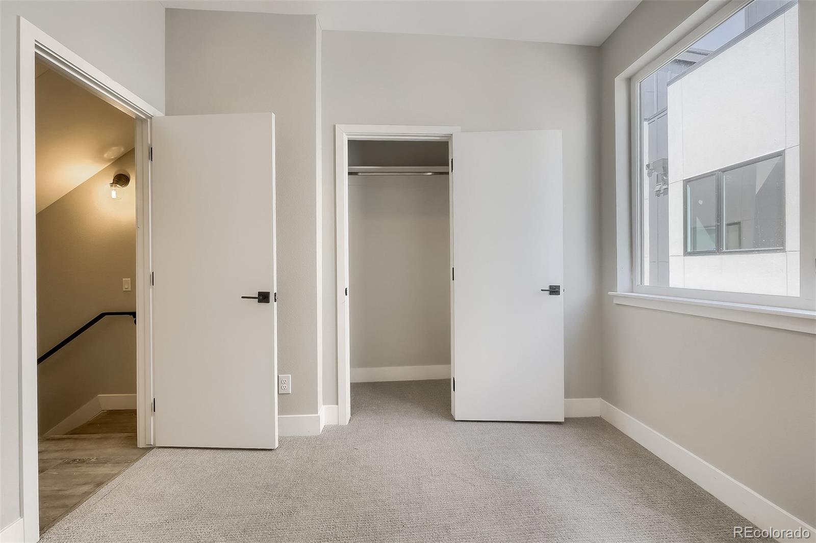 3820 Jason Street, Unit 6 Denver, CO 80211 - Photo 27 of 36 an empty room with windows and closet