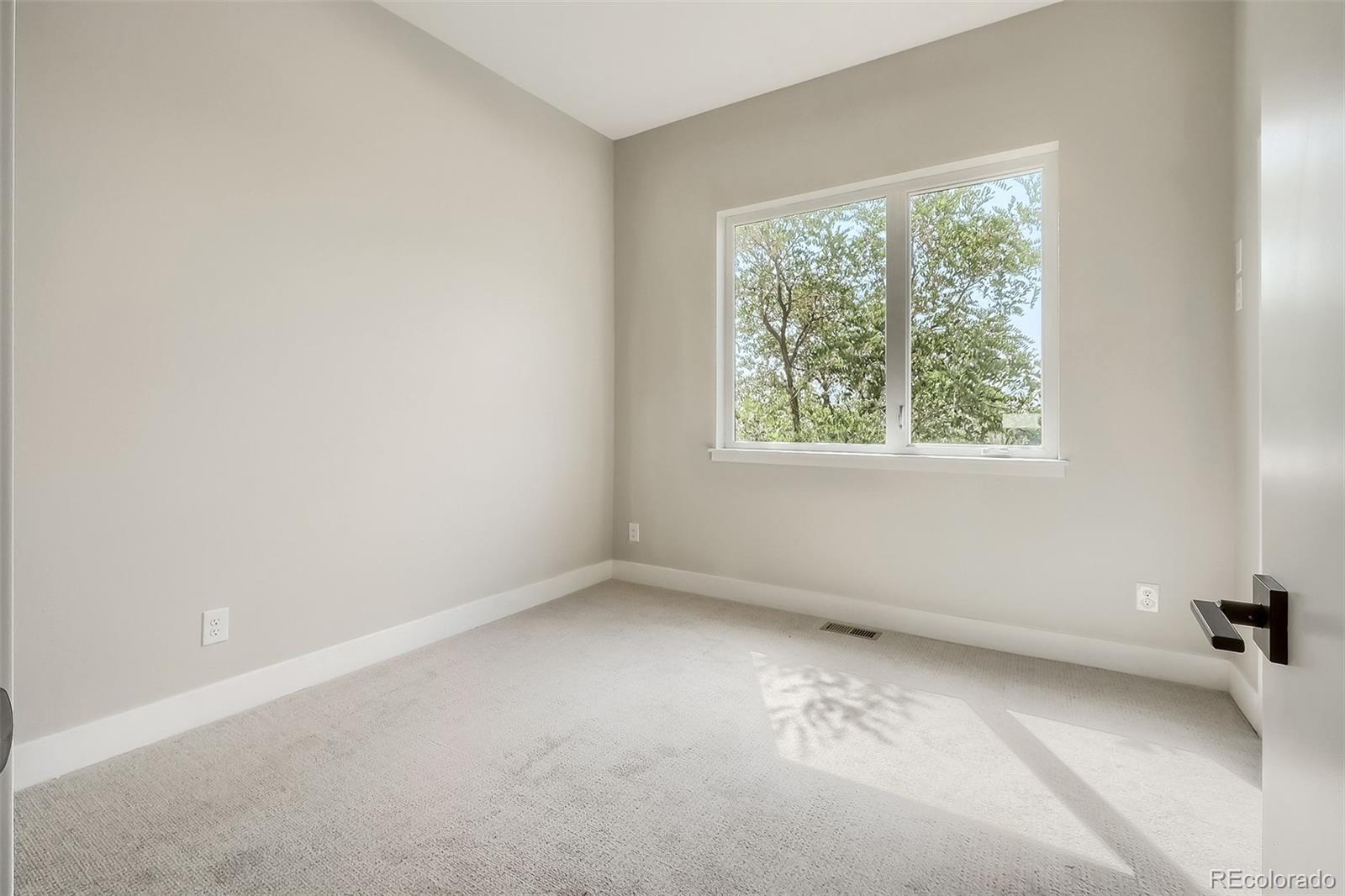 3820 Jason Street, Unit 6 Denver, CO 80211 - Photo 28 of 36 an empty room with a window