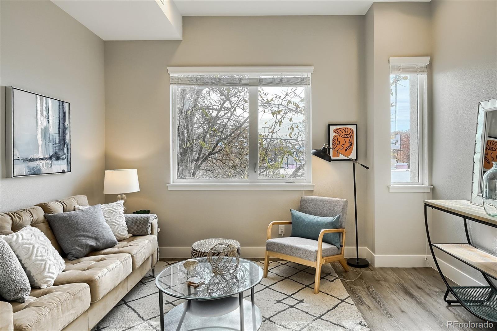 3820 Jason Street, Unit 6 Denver, CO 80211 - Photo 10 of 36 a living room with furniture and a window