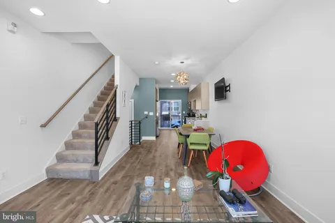 a view of entryway livingroom and hall