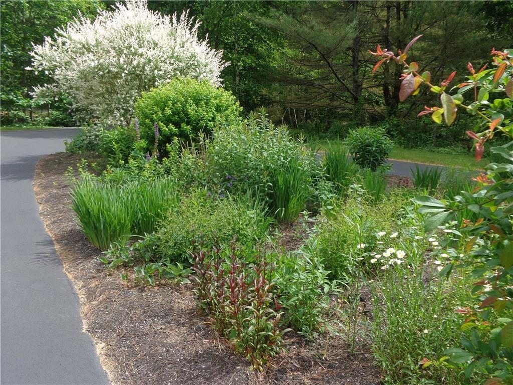 1 Hammond Road Kennebunk, ME 04043 - Photo 31 of 33 Lots of Perennial Gardens adorn the...