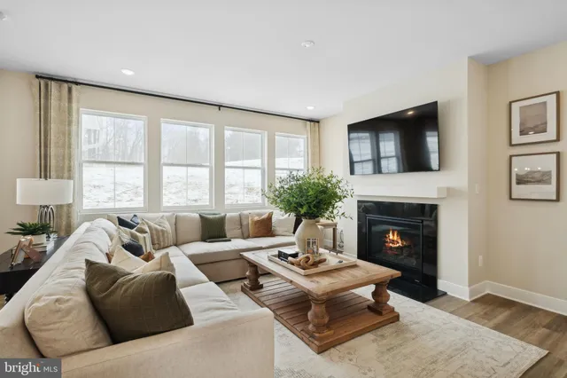 a view of a dining room with furniture and window
