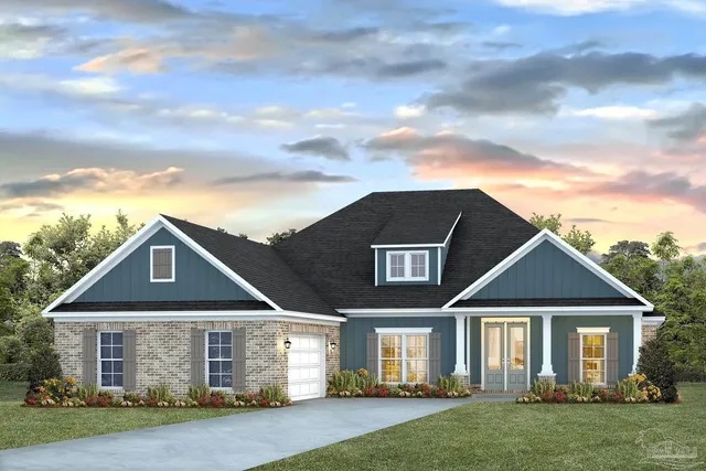 front view of a house with a yard