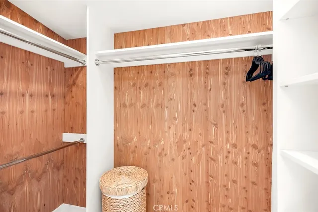 a bathroom with a toilet and a shower curtain