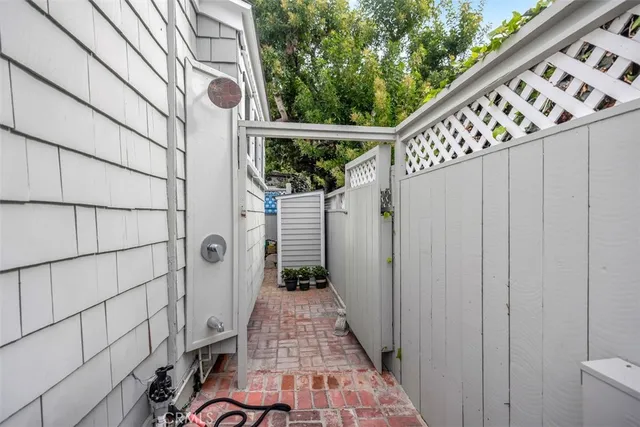 a view of a porch with wooden floor and stairs