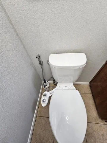 a close view of a toilet in a bathroom