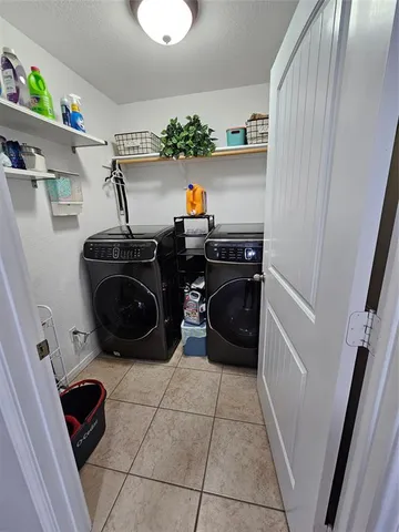 a kitchen with a sink and a stove