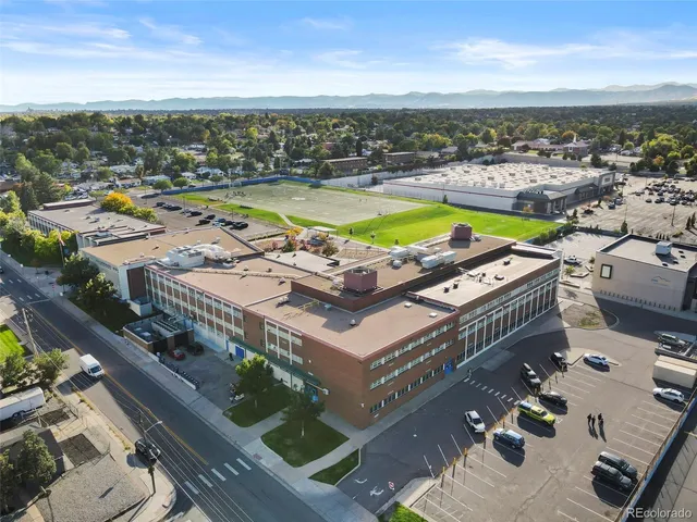 an aerial view of a house with a ocean view