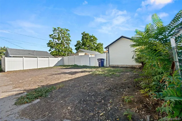 a house with a yard and garage