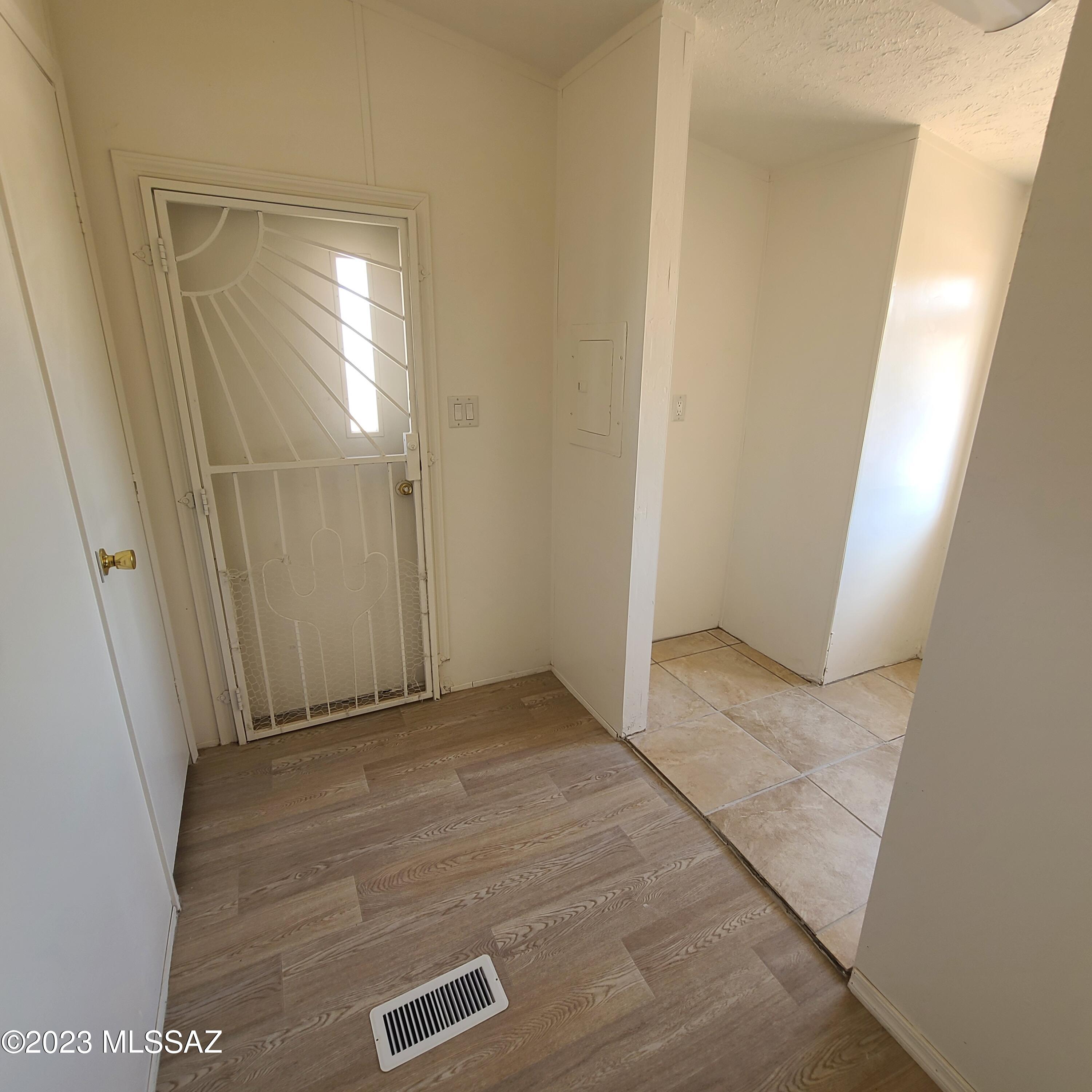 8896 South Marstellar Road Tucson, AZ 85736 - Photo 29 of 39 an empty room with windows