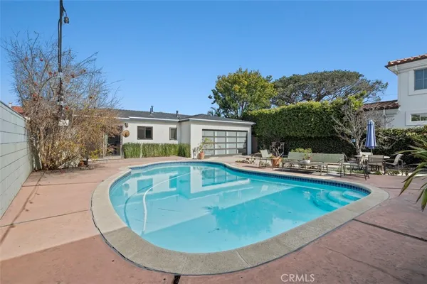 a view of a house with swimming pool