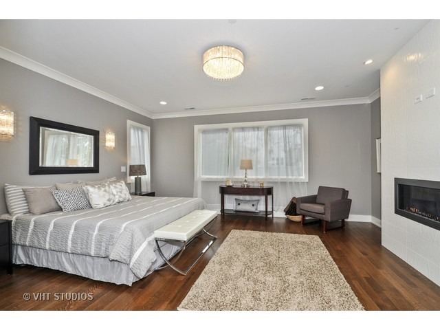 1324 West Melrose Street Chicago, IL 60657 - Photo 11 of 20 a bedroom with a bed and a couch