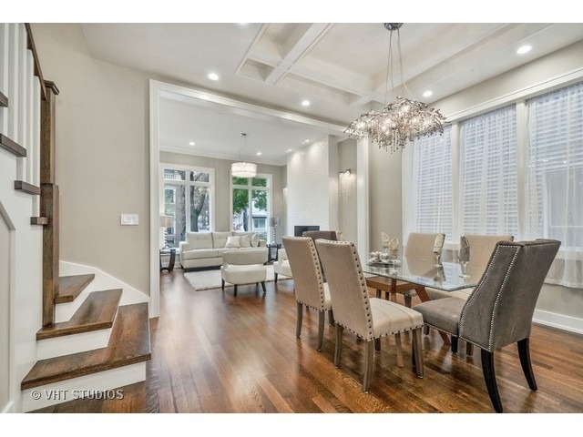 1324 West Melrose Street Chicago, IL 60657 - Photo 3 of 20 a view of a dining room with furniture window and wooden floor