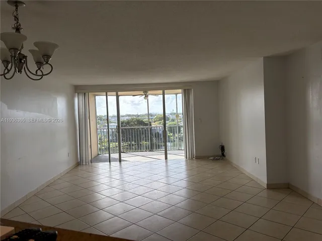a view of an empty room and window
