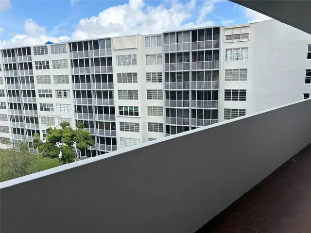 a view of building with large windows