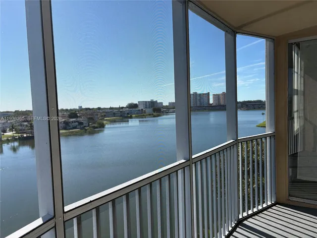 a view of a balcony next to a lake view