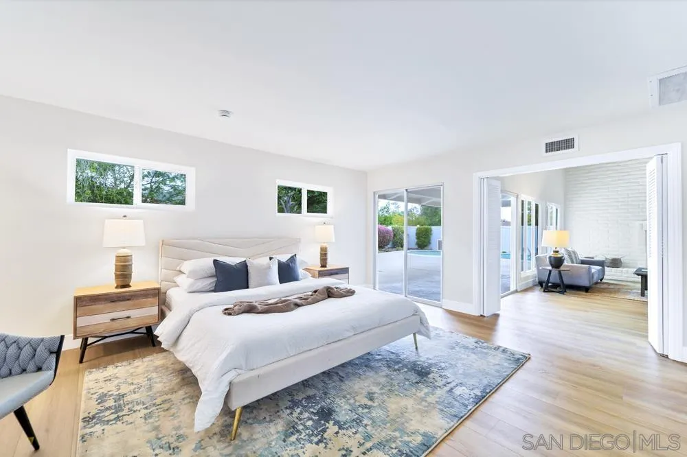 3563 Oak Cliff Drive Fallbrook, CA 92028 - Photo 17 of 43 a bedroom with bed couch and view of living room