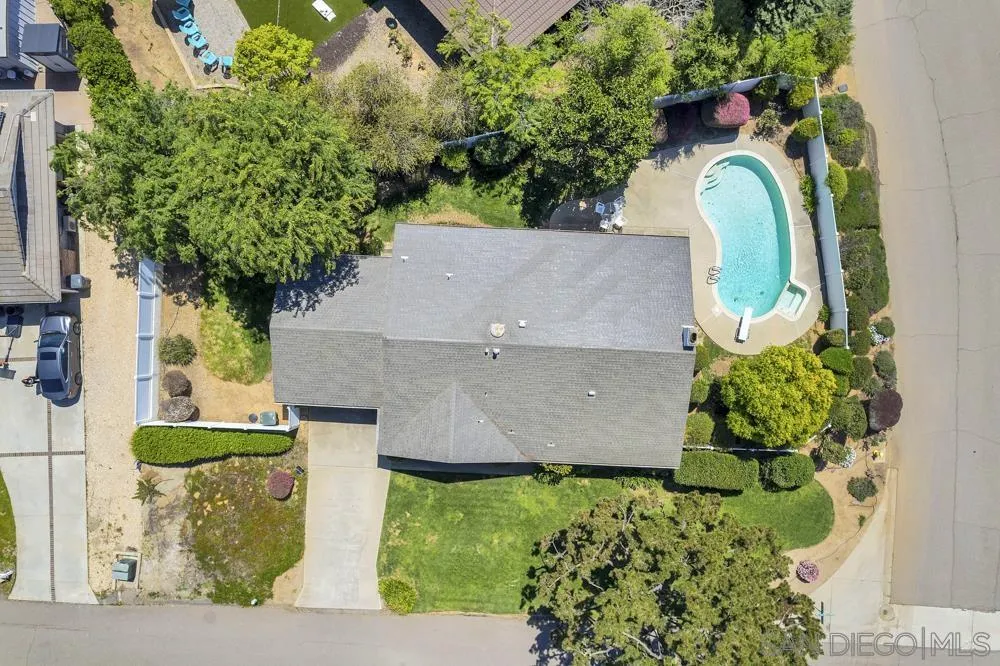 3563 Oak Cliff Drive Fallbrook, CA 92028 - Photo 32 of 43 an aerial view of a house with garden space and a street view