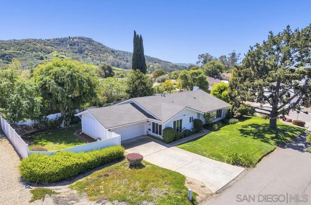 3563 Oak Cliff Drive Fallbrook, CA 92028 - Photo 35 of 43 a view of a house with a yard and sitting area