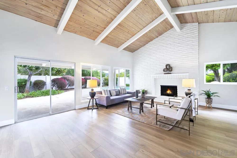 3563 Oak Cliff Drive Fallbrook, CA 92028 - Photo 5 of 43 a living room with fireplace furniture and a fireplace