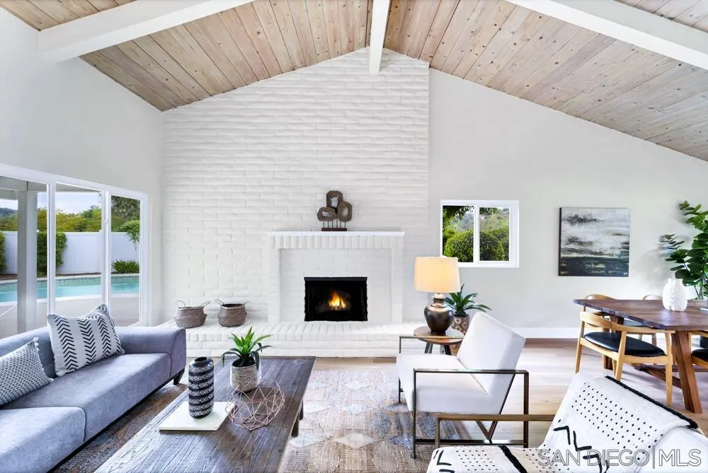 3563 Oak Cliff Drive Fallbrook, CA 92028 - Photo 7 of 43 a living room with furniture and a fireplace