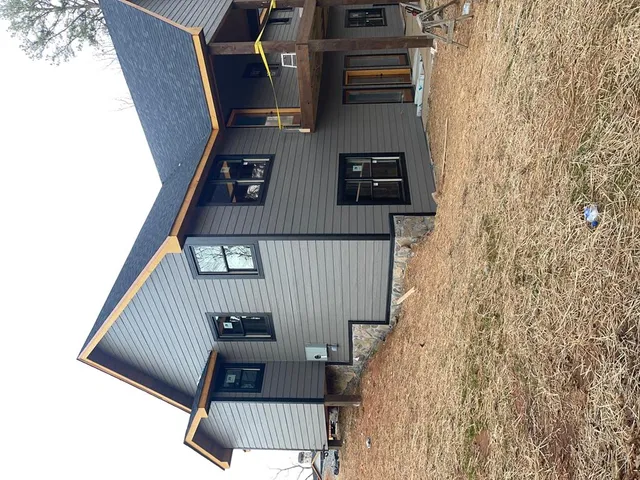 a view of balcony with wooden floor