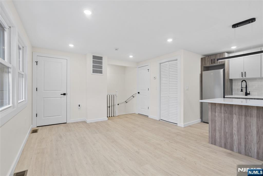 369 Hops Lane Secaucus, NJ 07094 - Photo 13 of 17 a view of kitchen with wooden floor