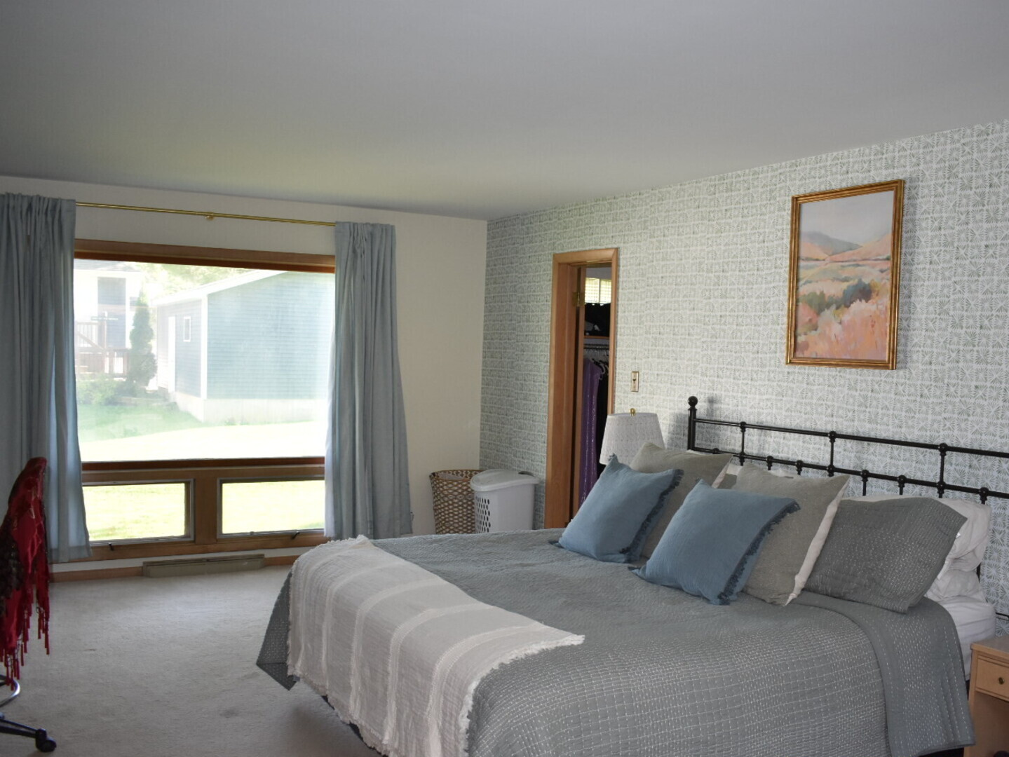 405 Prairie Court Streator, IL 61364 - Photo 10 of 16 a bedroom with a large bed and a large window