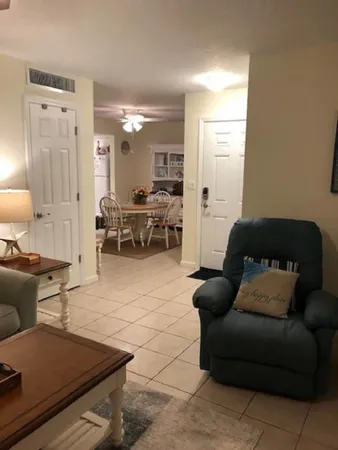 a living room with furniture and a couch