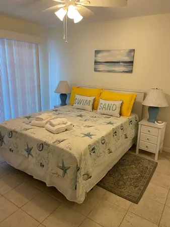 a view of a swimming pool with an outdoor space and seating area