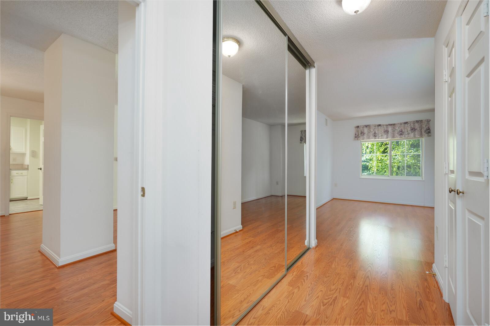 14800 Pennfield Circle, Unit 202 Silver Spring, MD 20906 - Photo 15 of 30 Mirrored closet doors with 2 closets
