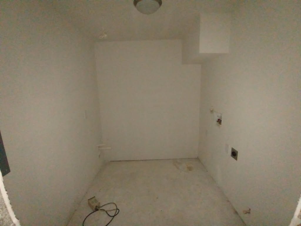 112 Ila Street Elgin, TX 78621 - Photo 10 of 27 Laundry area featuring hookup for an electric dryer and washer hookup