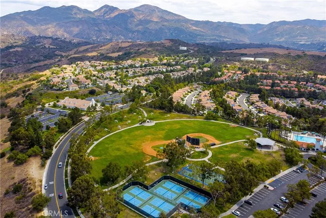 a view of a city with mountains in the background