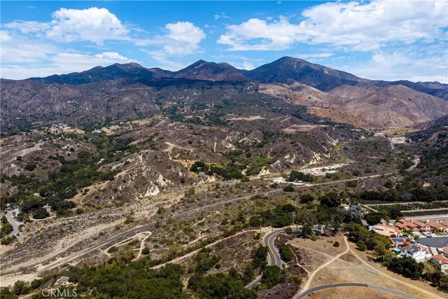 a view of a swimming pool with a yard