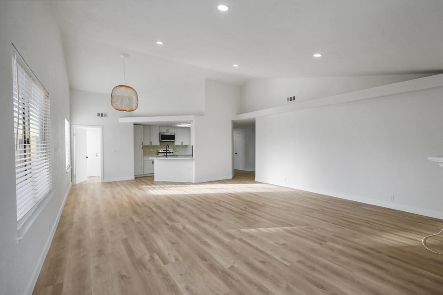 1128 Raymond Drive Modesto, CA 95351 - Photo 13 of 32 a view of a kitchen with a sink and a window